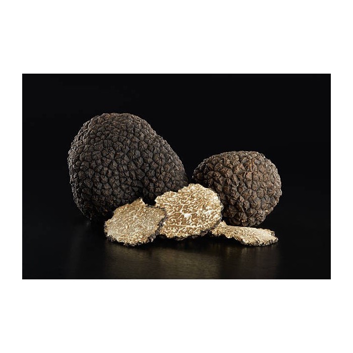 Slices of dried black winter truffle or brumale from Provence
