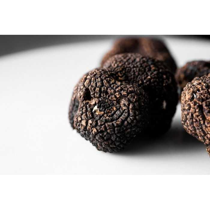 Precious whole organic black truffle in brine from Italy - direct p...