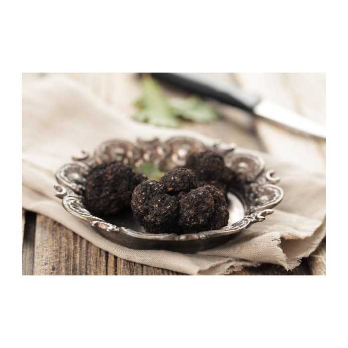 Precious whole organic black truffle in brine from Italy - direct p...
