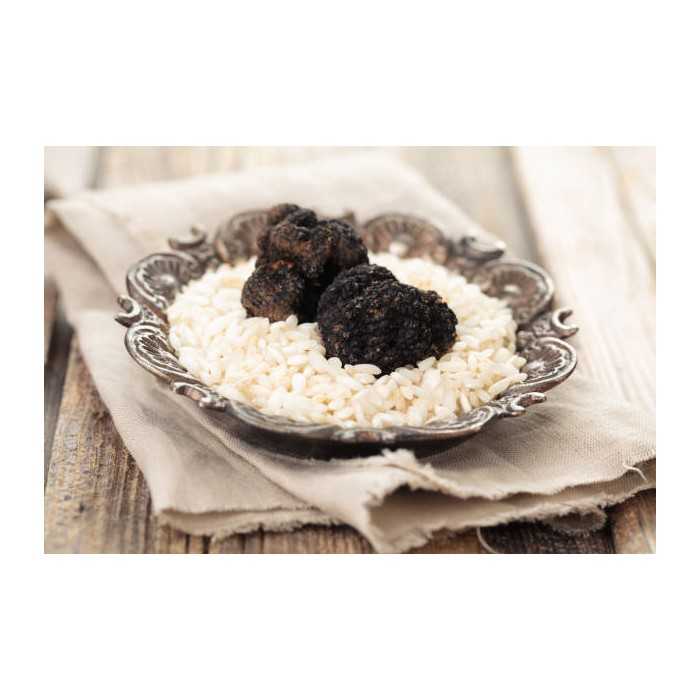 Precious whole organic black truffle in brine from Italy - direct p...